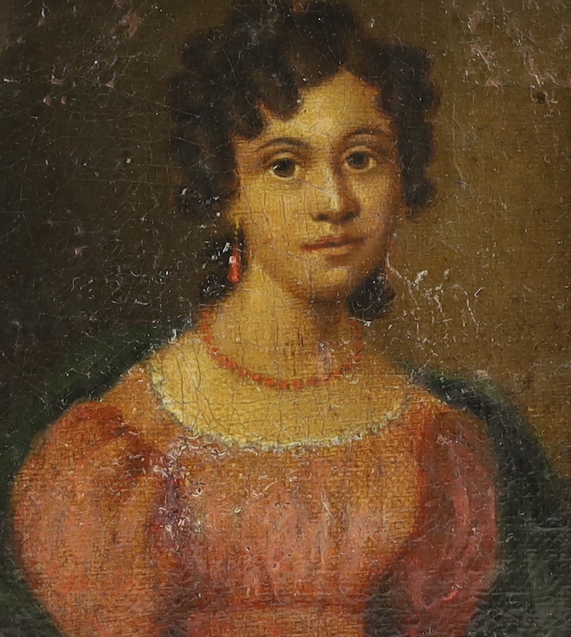 Early 19th century, oil on board, Portrait miniature of a Regency lady wearing coral earrings and necklace, 9 x 7.5cm